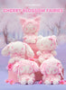 Five pink and white plush toys styled as cherry blossom fairies, arranged on pink display blocks against a soft pink cherry blossom forest backdrop. Text at the top reads 'NEW ARRIVALS CHERRY BLOSSOM FAIRIES'.
