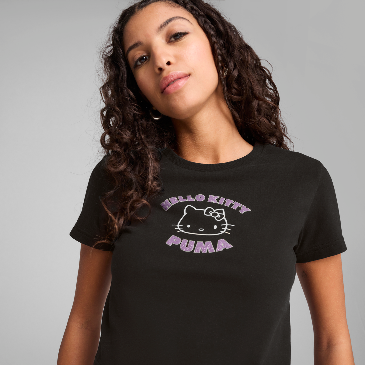 Hello Kitty x PUMA Graphic Baby Tee (PUMA Black) Hello Kitty x PUMA Graphic Baby Tee (PUMA Black)