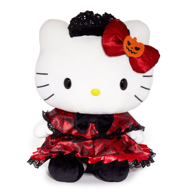 A Hello Kitty plush in a red dress