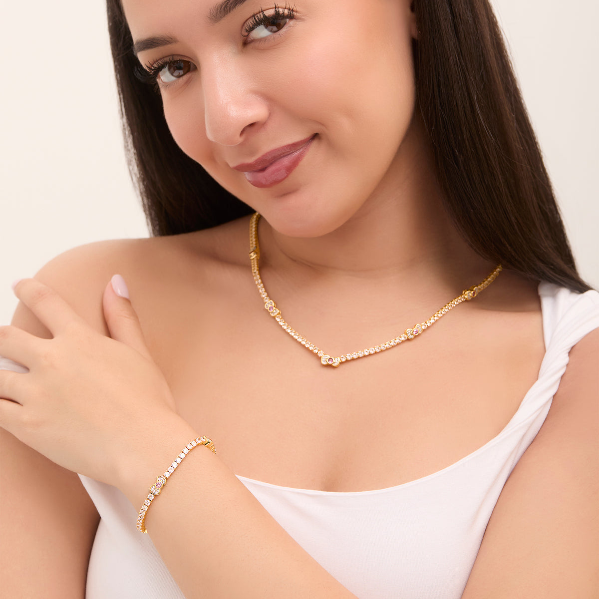 Hello Kitty Two-Tone Gold Plated Bow Tennis Bracelet (Pink & White Sapphire) Jewelry JACMEL JEWELRY INC