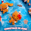 Gingerbread-themed Sanrio Plush and candies on a blue background with 'Christmas in June' text.