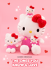 Hello Kitty plush toy family on a pink background with hearts and stars.
