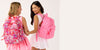 Hello Kitty and Friends x Vera Bradley Collection featuring two models with matching backpacks. 