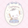 Cogimyun character with a tiara and bow in a decorative frame on a pink quilted background.
