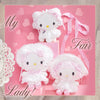 Decorative display with Sanrio Characters and bags on a pink background.